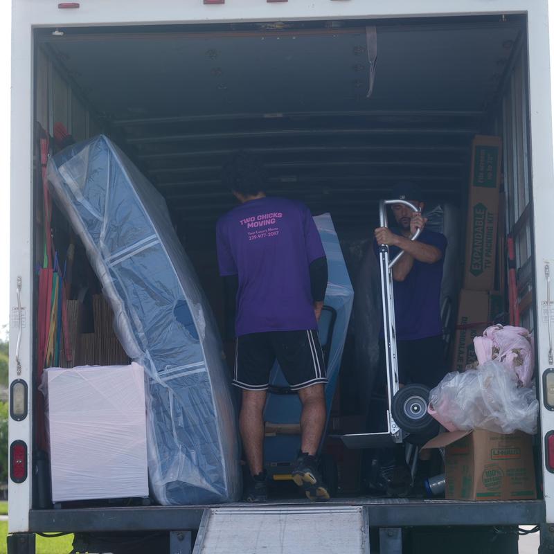 Mattress and furniture moving inside a storage truck