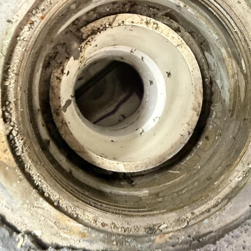 Main line pipe interior view with buildup and debris Main line pipe interior view with buildup and debris
