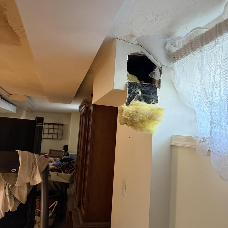 Bathroom vent duct with insulation and wall opening Bathroom vent duct with insulation and wall opening