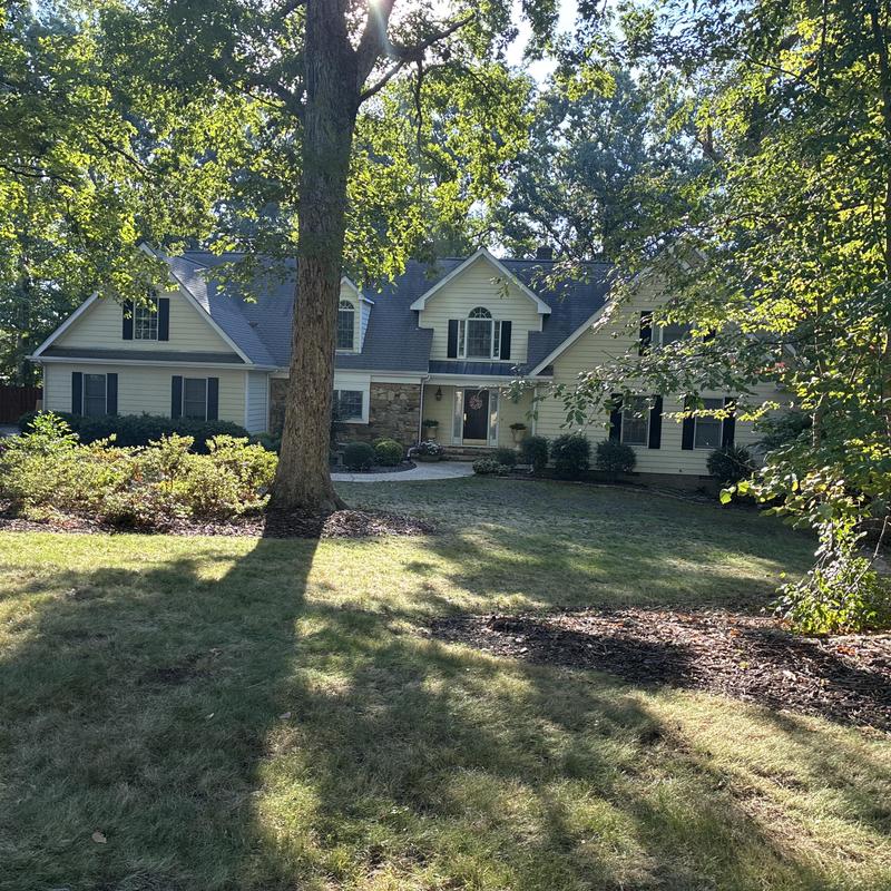 Roof and tree damage on residential home in Raleigh, NC Roof and tree damage on residential home in Raleigh, NC