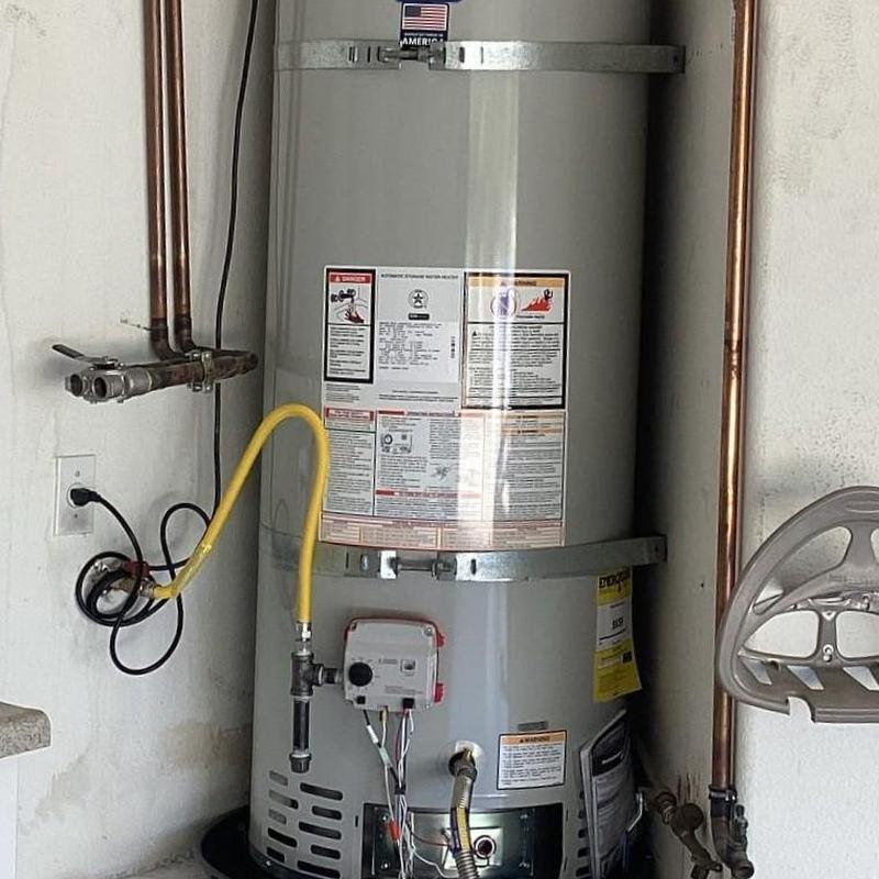 Bradford White water heater with new gas line and pan