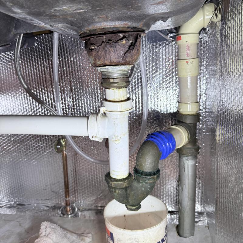 Kitchen sink drain pipes with new valve fittings Kitchen sink drain pipes with new valve fittings