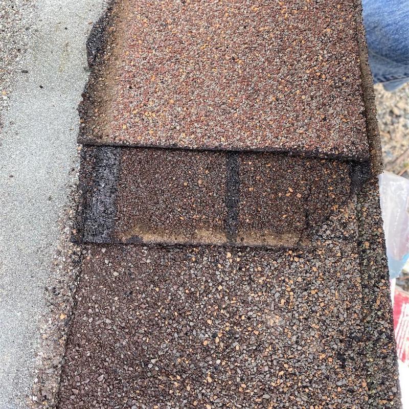 Asphalt composition roofing shingle layers close-up