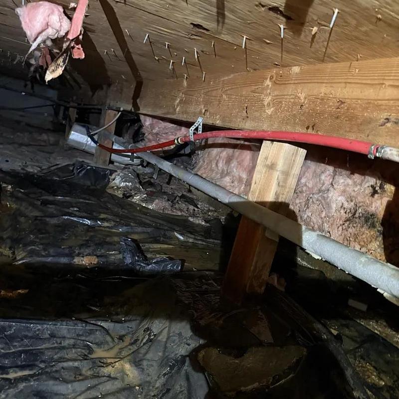 Water supply piping repair in crawl space with supports Water supply piping repair in crawl space with supports