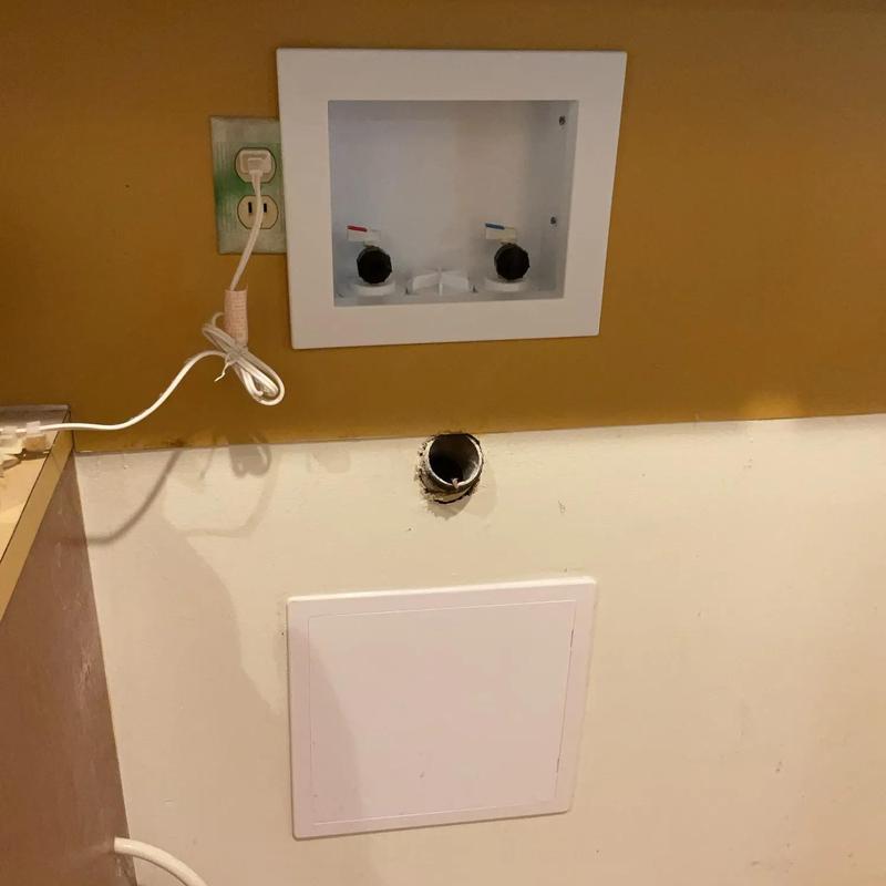 Recessed washer box with valve connections installed Recessed washer box with valve connections installed