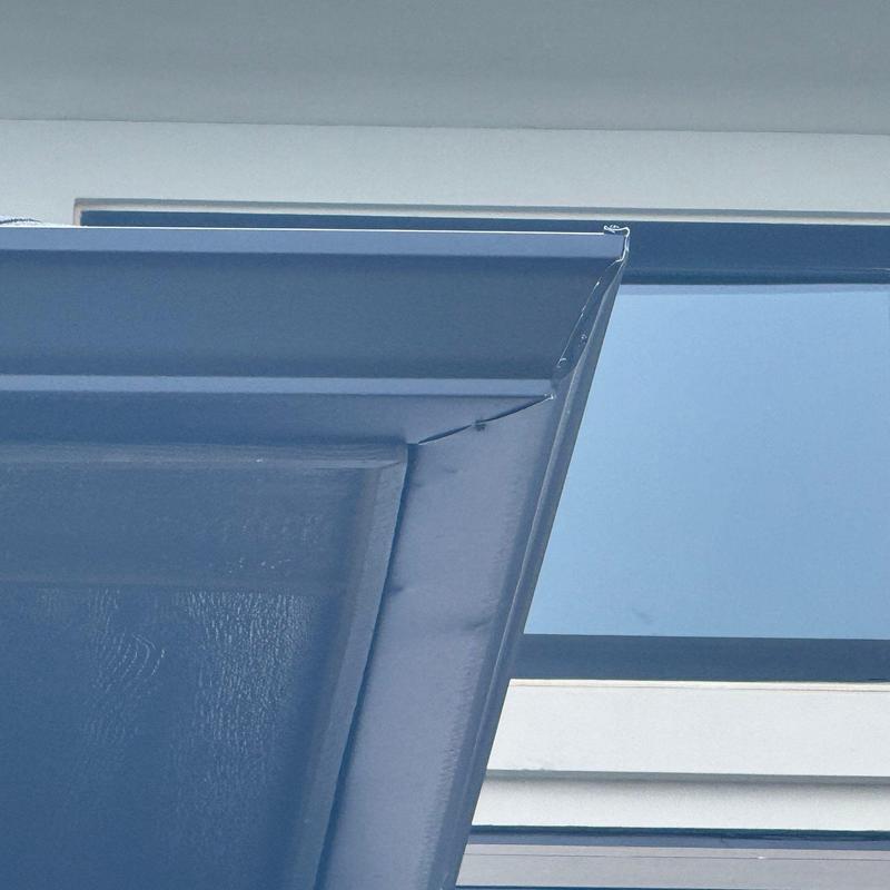 Metal door frame corner with minor damage Metal door frame corner with minor damage