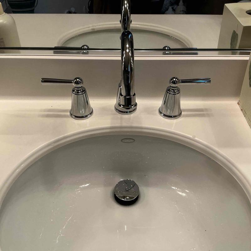 Widespread chrome faucet and pop-up drain assembly