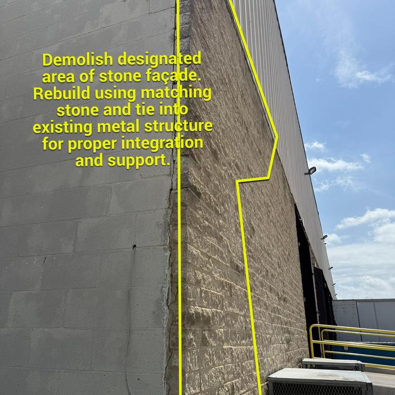 Stone façade demolition and rebuilding on commercial building Stone façade demolition and rebuilding on commercial building