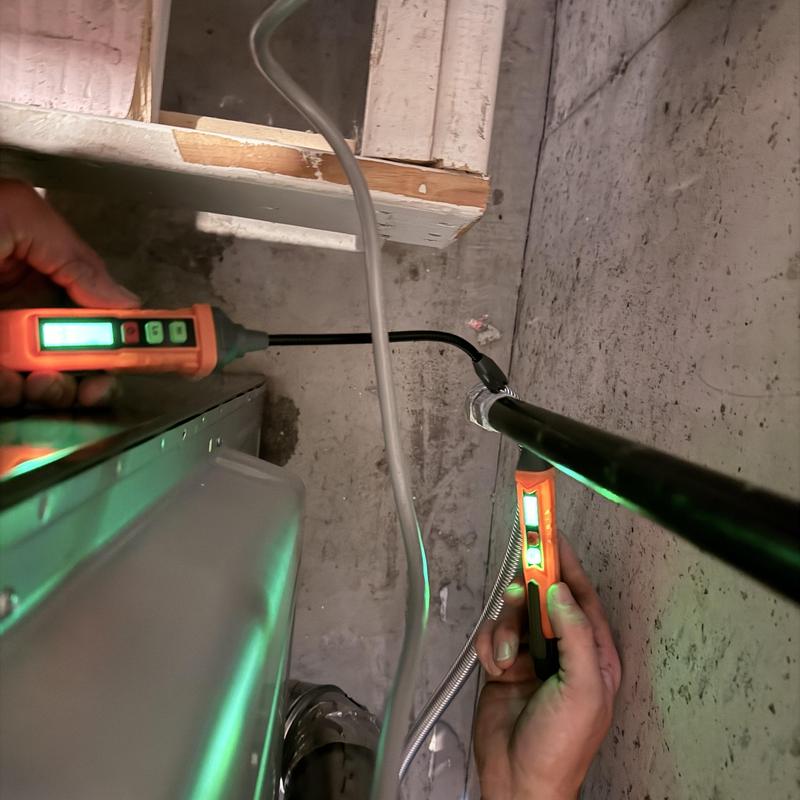 Dryer vent installation with testing tools in basement Dryer vent installation with testing tools in basement