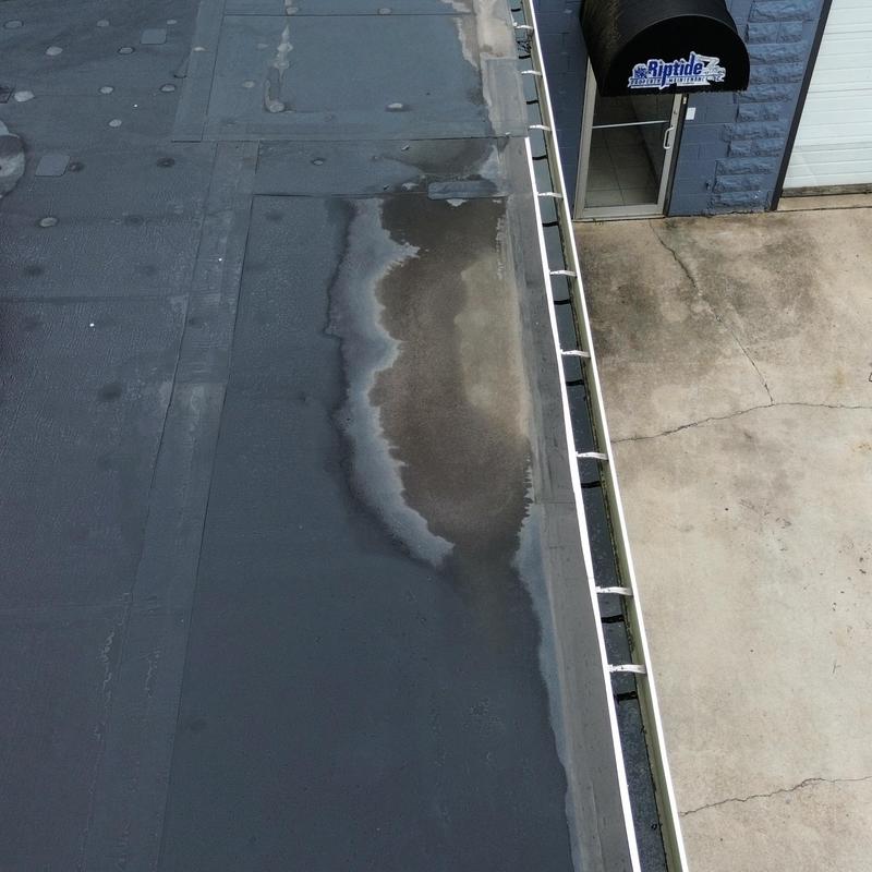 EPDM commercial roof inspection with water stains EPDM commercial roof inspection with water stains