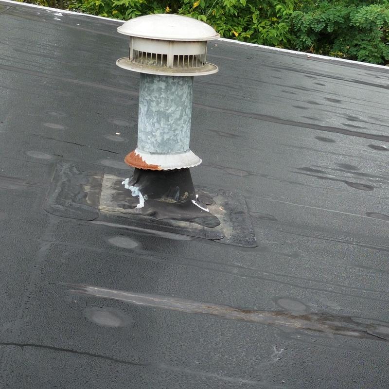 EPDM roof vent flashing with rust and sealant EPDM roof vent flashing with rust and sealant