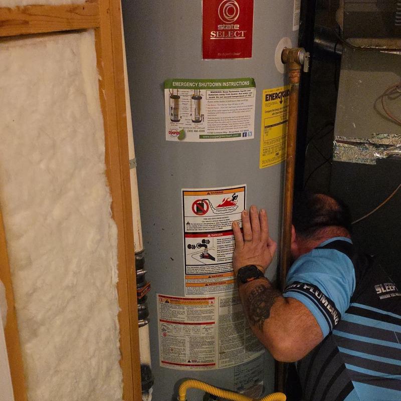 Water heater installation with technician inspection