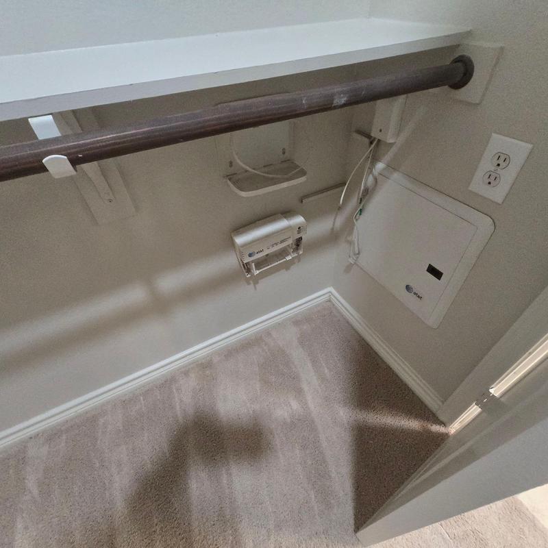 AT&T network panel and wiring in closet corner AT&T network panel and wiring in closet corner