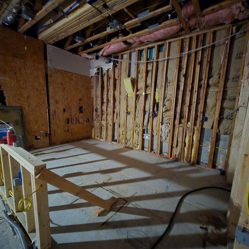 Wall insulation and wood framing installation in progress Wall insulation and wood framing installation in progress