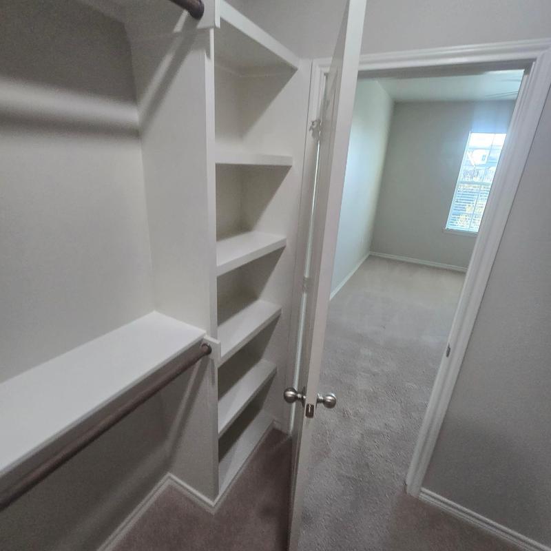 Closet shelving and hanging rod installation in bedroom Closet shelving and hanging rod installation in bedroom