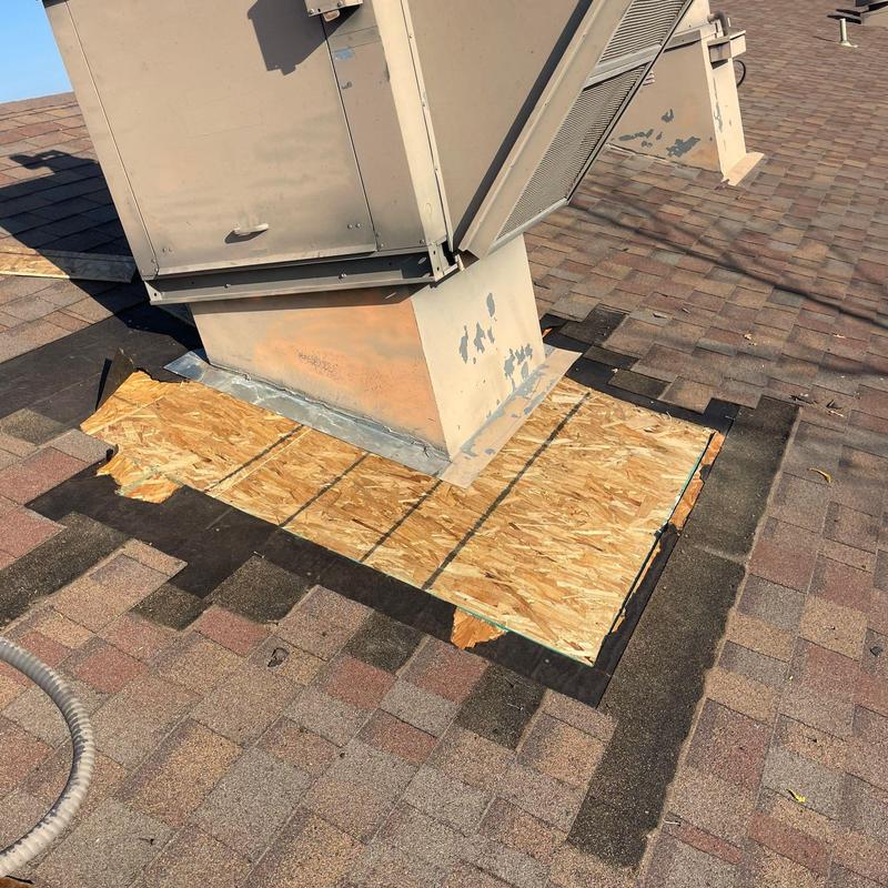 Roof vent base with plywood patch on shingle roof Roof vent base with plywood patch on shingle roof