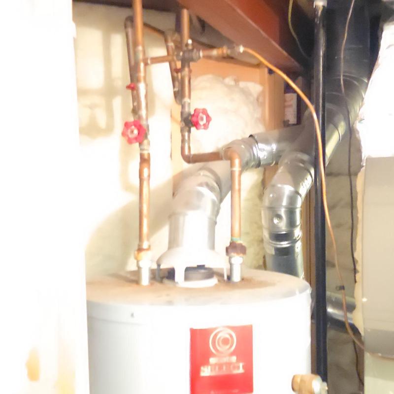 Water heater with copper flex water lines and valves