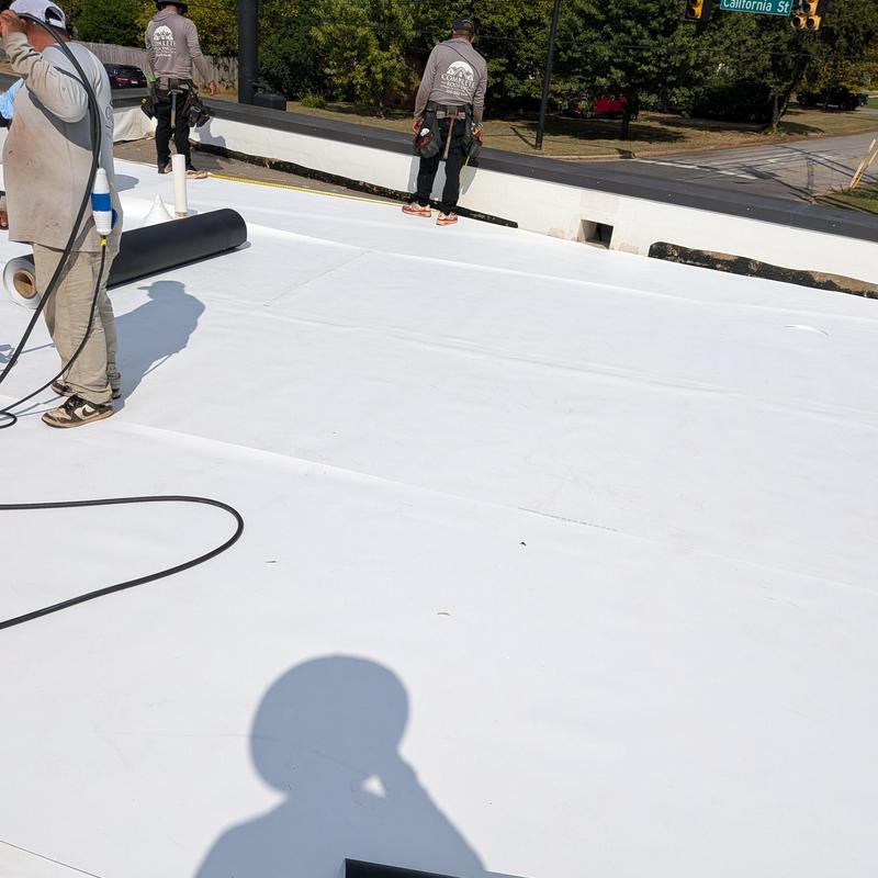 TPO roofing installation on commercial flat roof
