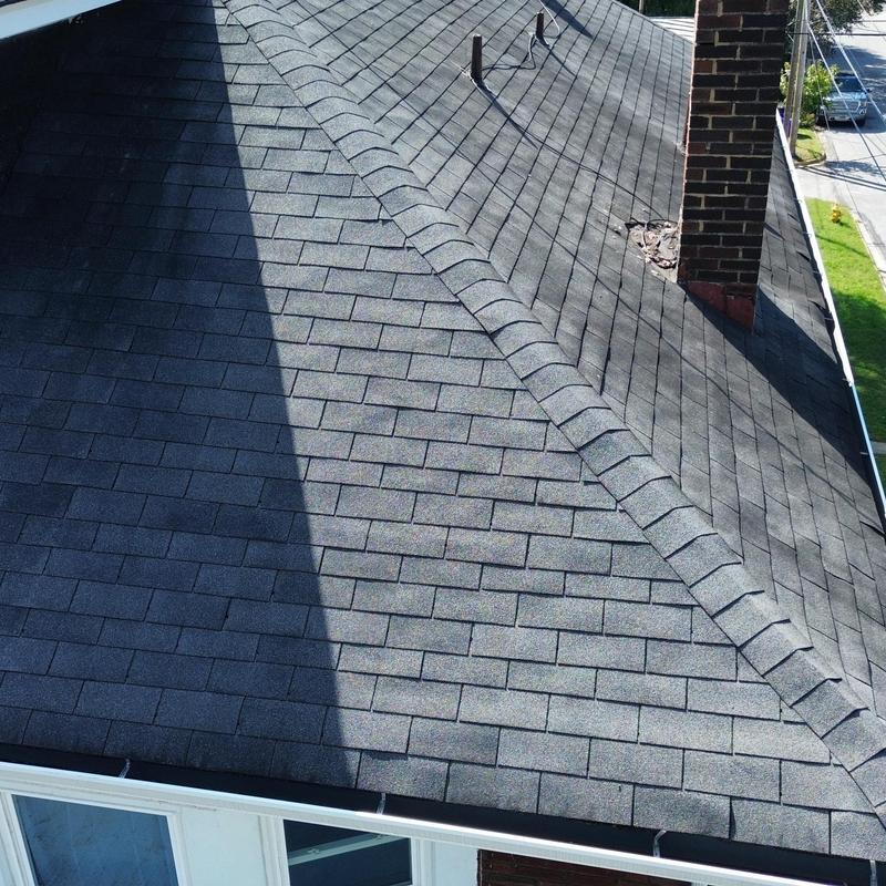 Asphalt shingle roof with chimney and flashing detail Asphalt shingle roof with chimney and flashing detail