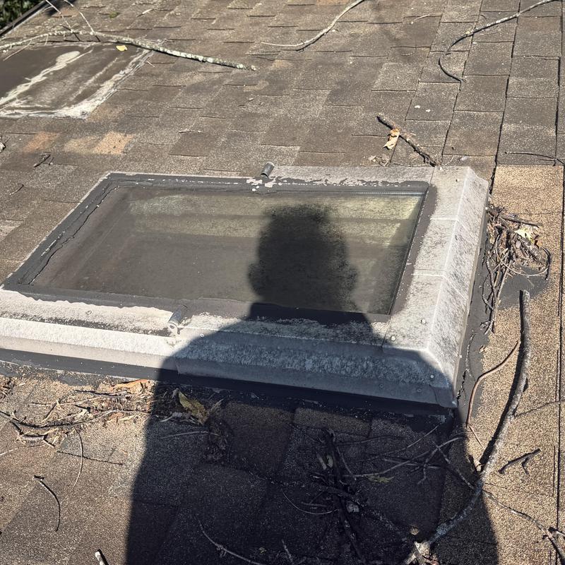 Skylight flashing and roofing shingle leaks on roof Skylight flashing and roofing shingle leaks on roof