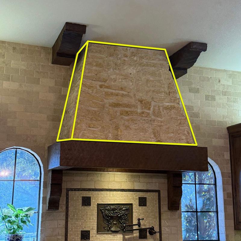 Stone chimney hood with wooden beams in kitchen Stone chimney hood with wooden beams in kitchen
