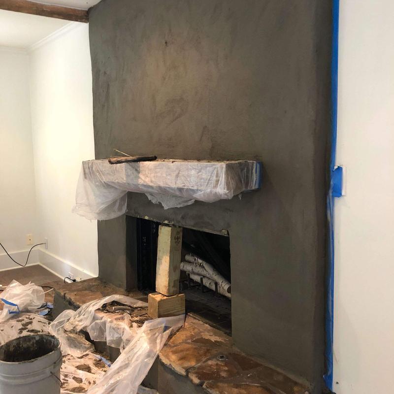 Concrete chimney surface with vent hood under construction Concrete chimney surface with vent hood under construction