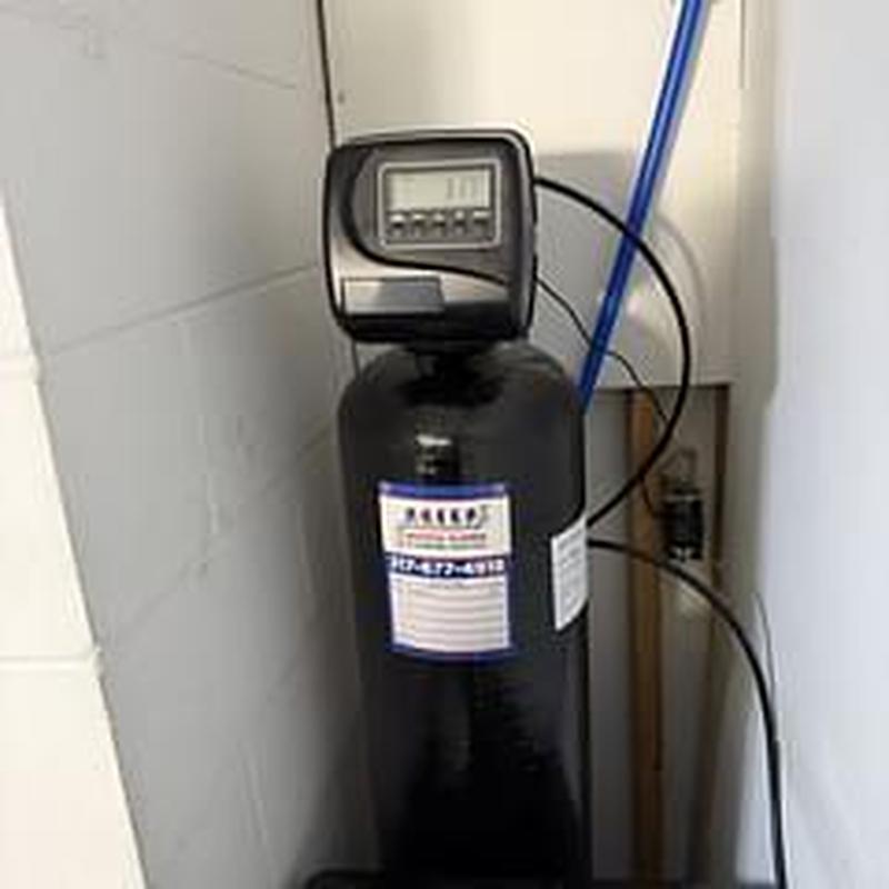 Water softener system with digital control panel installed
