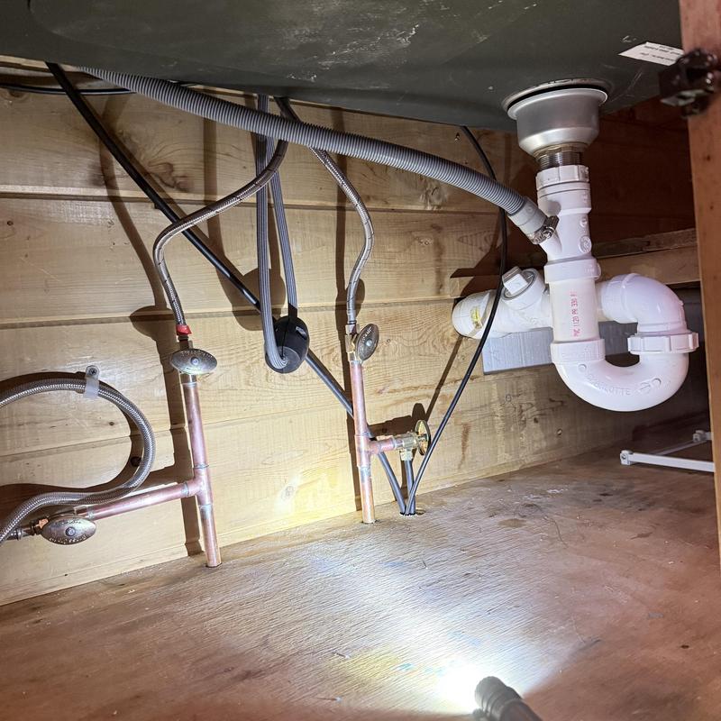 Kitchen sink drain piping and water supply valves Kitchen sink drain piping and water supply valves