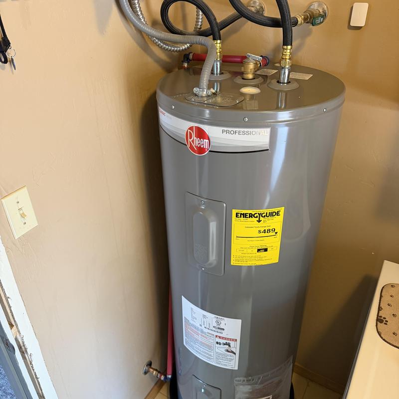50 gallon electric water heater with new pan installed 50 gallon electric water heater with new pan installed