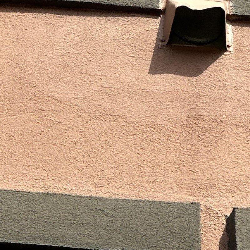 Stucco wall with vent pipe section and trim detail Stucco wall with vent pipe section and trim detail