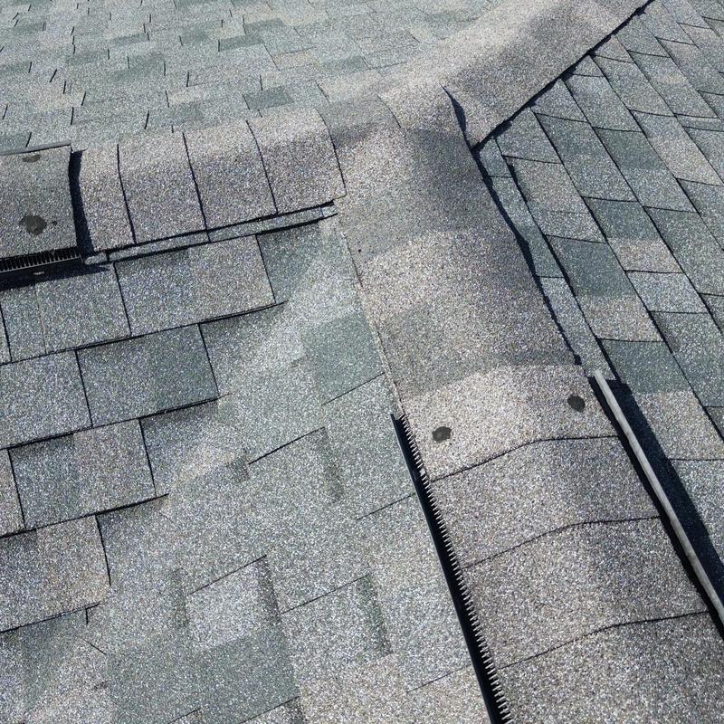 Roof shingles inspection showing ridge and valley areas Roof shingles inspection showing ridge and valley areas
