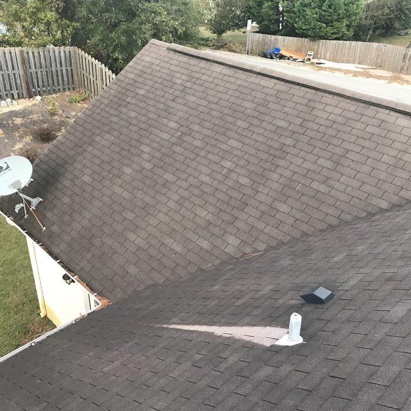 Shingle roof with new ridge cap and vents