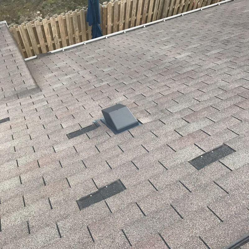 Shingle roof with vent and ridge cap installation