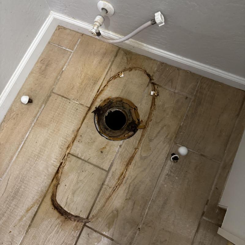 Toilet flange and wax ring removal on tiled floor Toilet flange and wax ring removal on tiled floor