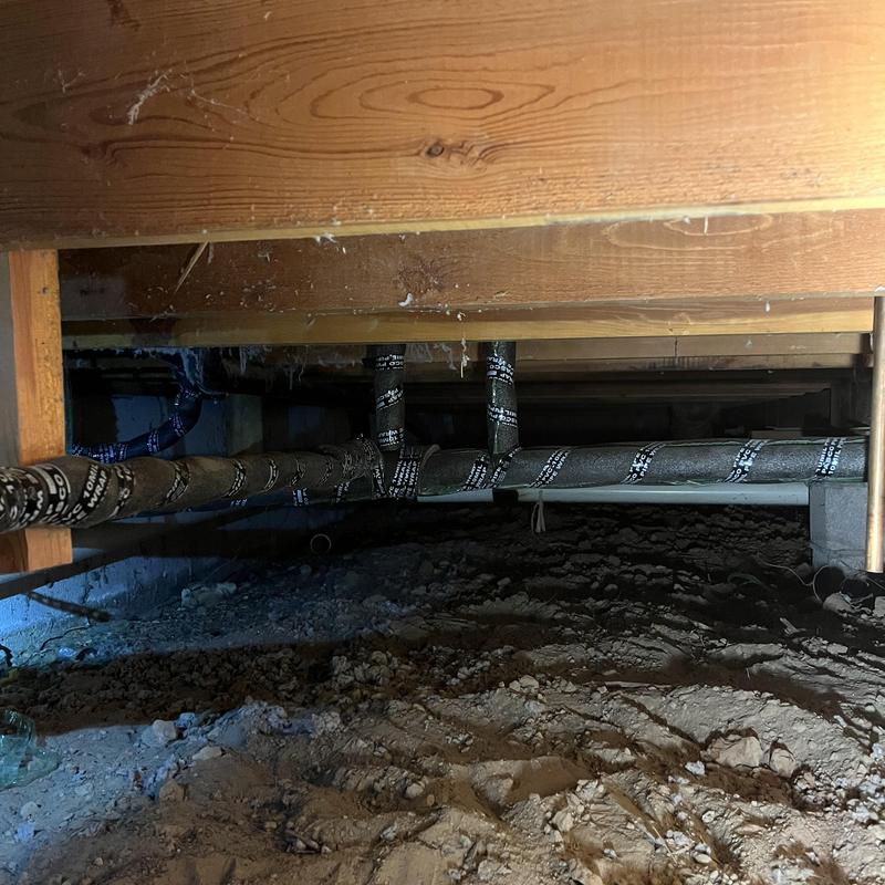 Waterline pipes with insulation in crawl space Waterline pipes with insulation in crawl space