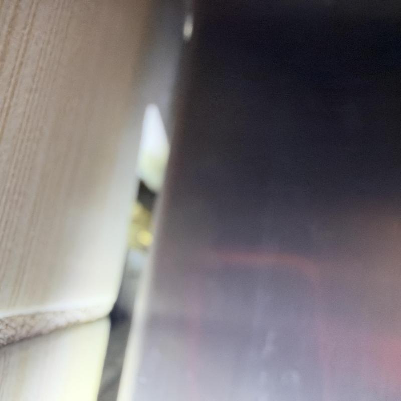 Metal siding gap and wall exterior joint closeup