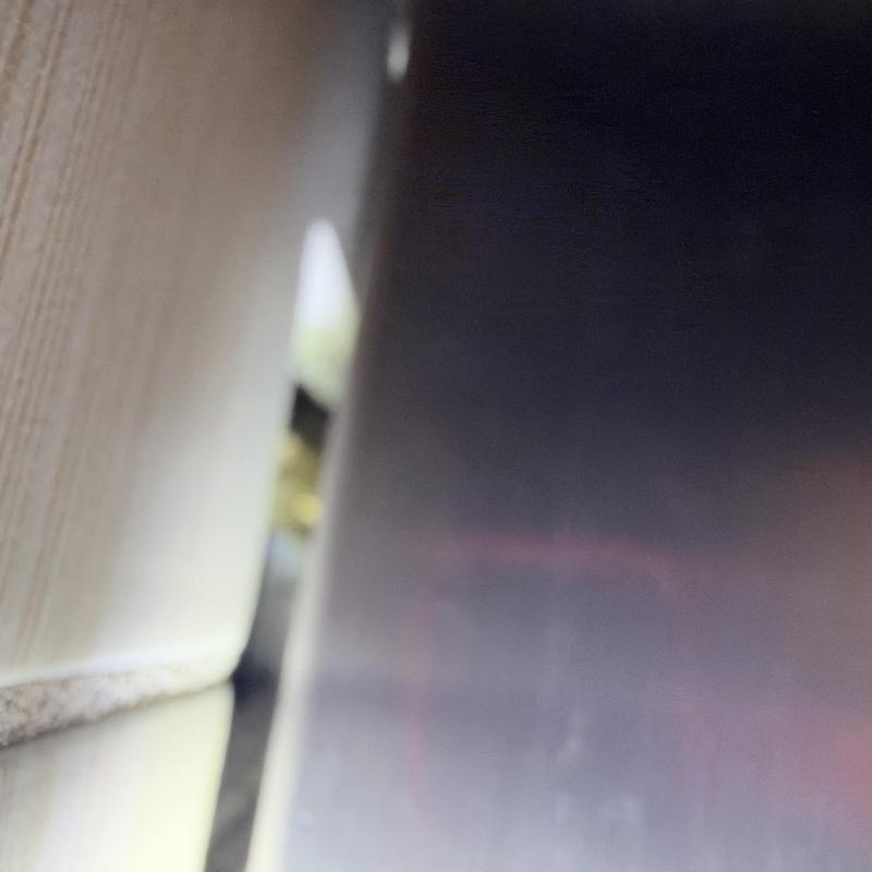 Narrow gap between wall and metal surface