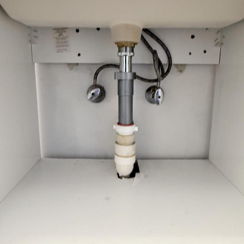 Sink drain trap replacement under cabinet with plumbing valves Sink drain trap replacement under cabinet with plumbing valves