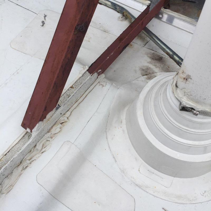 Low-slope roof membrane and flashing repair detail