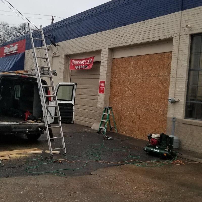 Service bay opening with new framing and sheathing