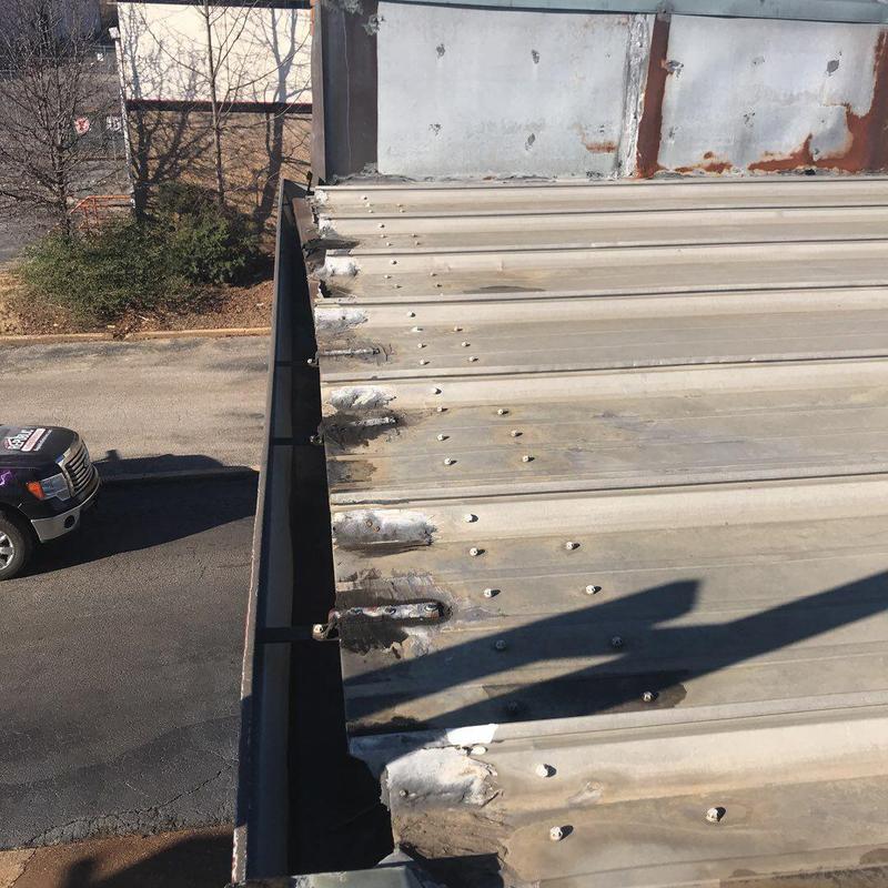 Metal roof panels and perimeter flashing repairs