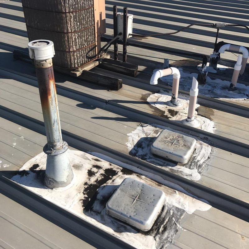 Metal roof pipe flashing with sealant repairs