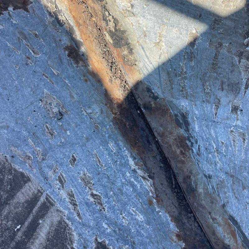 Metal roof seam rust and corrosion close-up Metal roof seam rust and corrosion close-up
