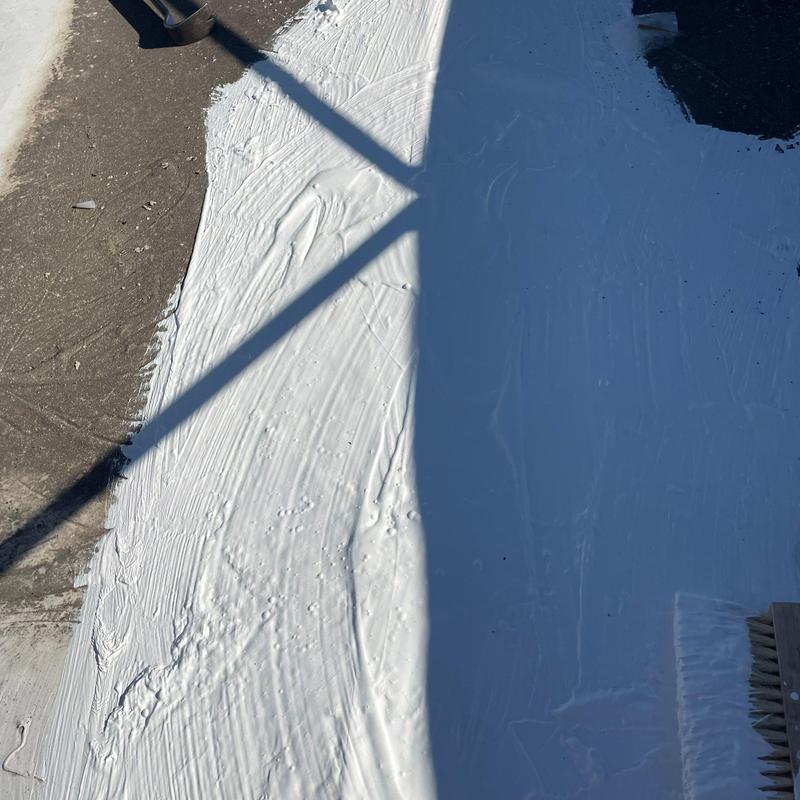 Shingle roof storm damage repair with sealant coating Shingle roof storm damage repair with sealant coating