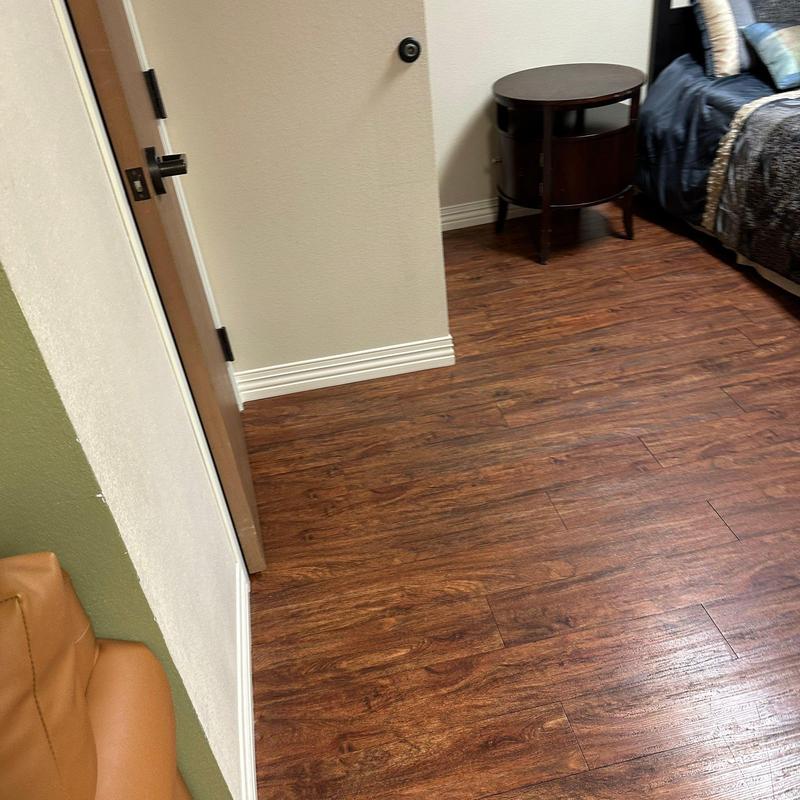 Wood laminate flooring in care center room Wood laminate flooring in care center room