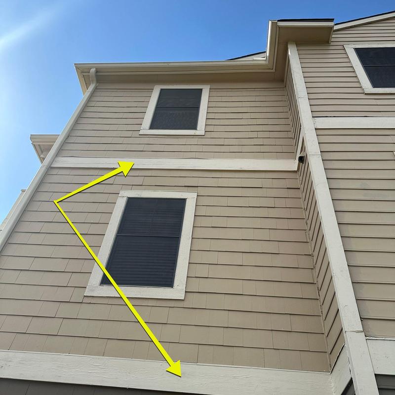 Exterior wood siding and trim damage on residential building Exterior wood siding and trim damage on residential building