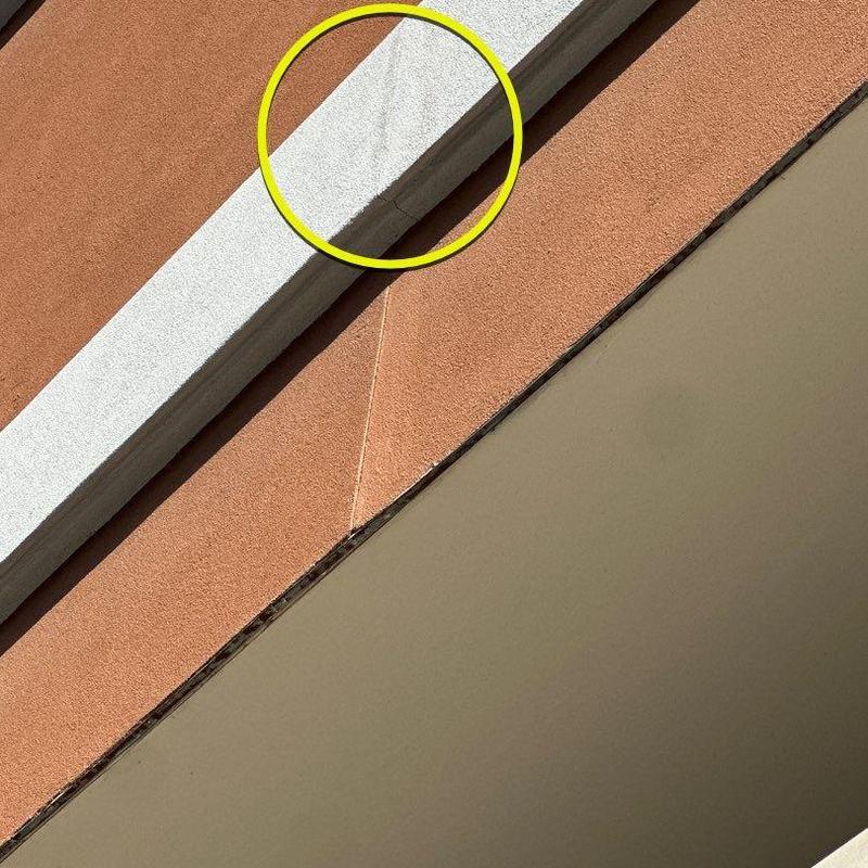 Concrete wall stucco damage repair at hotel exterior Concrete wall stucco damage repair at hotel exterior