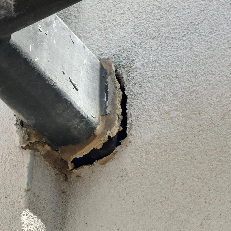 Stucco wall damage around wood beam attachment Stucco wall damage around wood beam attachment