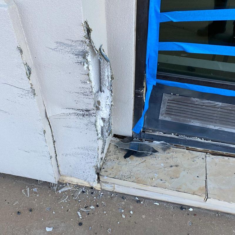 Stucco wall and door frame storm damage repair Stucco wall and door frame storm damage repair
