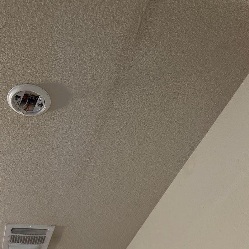 Ceiling water stain and smoke detector base installation Ceiling water stain and smoke detector base installation